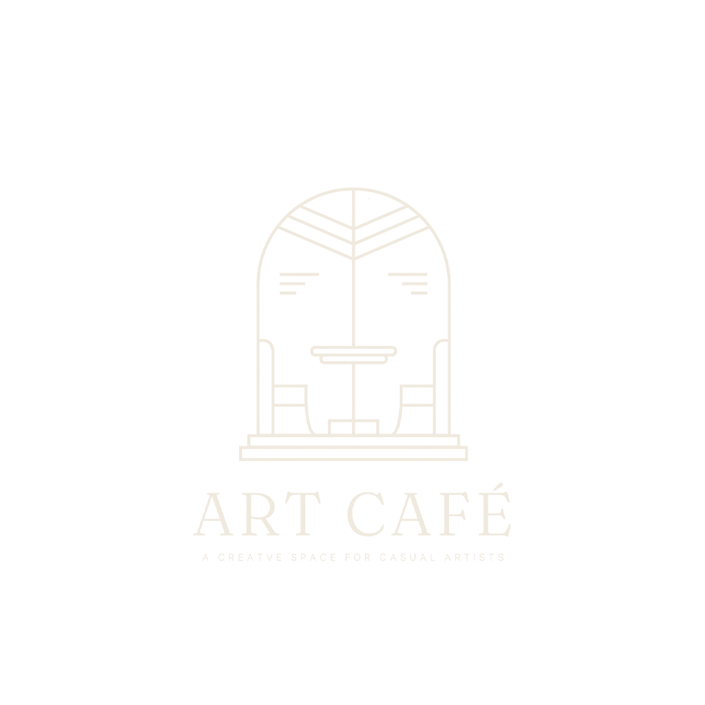People creating collage and drawing artwork at a table inside Art Café SLC creative studio in Salt Lake City